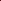 Close-up of burgundy velvet curtain fabric showing its soft sheen and flowing folds