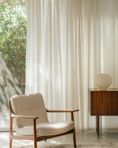 Dark curtains in a softly lit bedroom