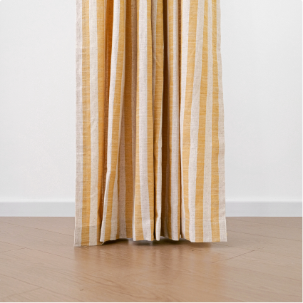 Curtain gently touching the floor